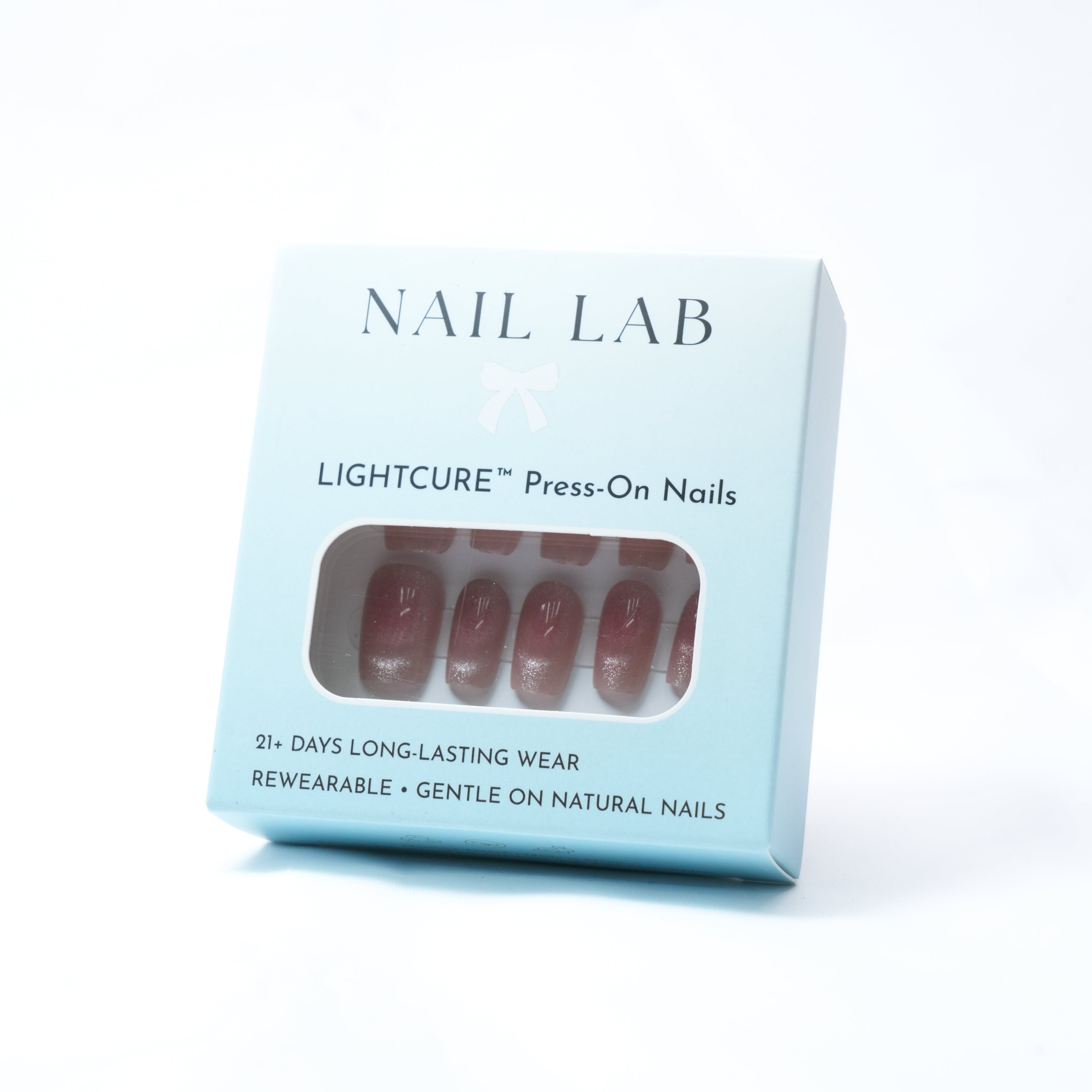 NAIL LAB LIGHTCURE press-on nails in blush pink with fine shimmer
