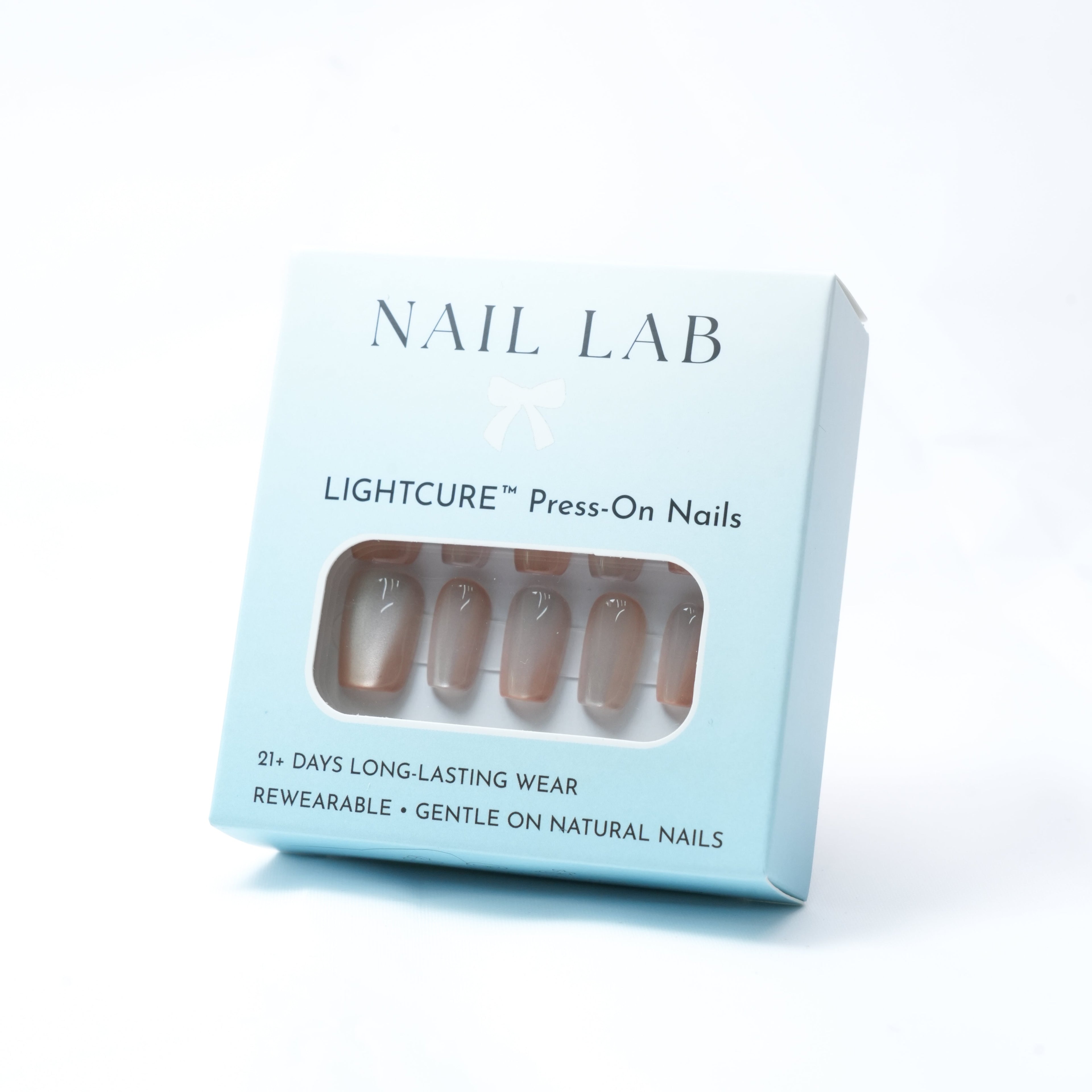 NAIL LAB LIGHTCURE press-on nails in warm beige nude with subtle glow