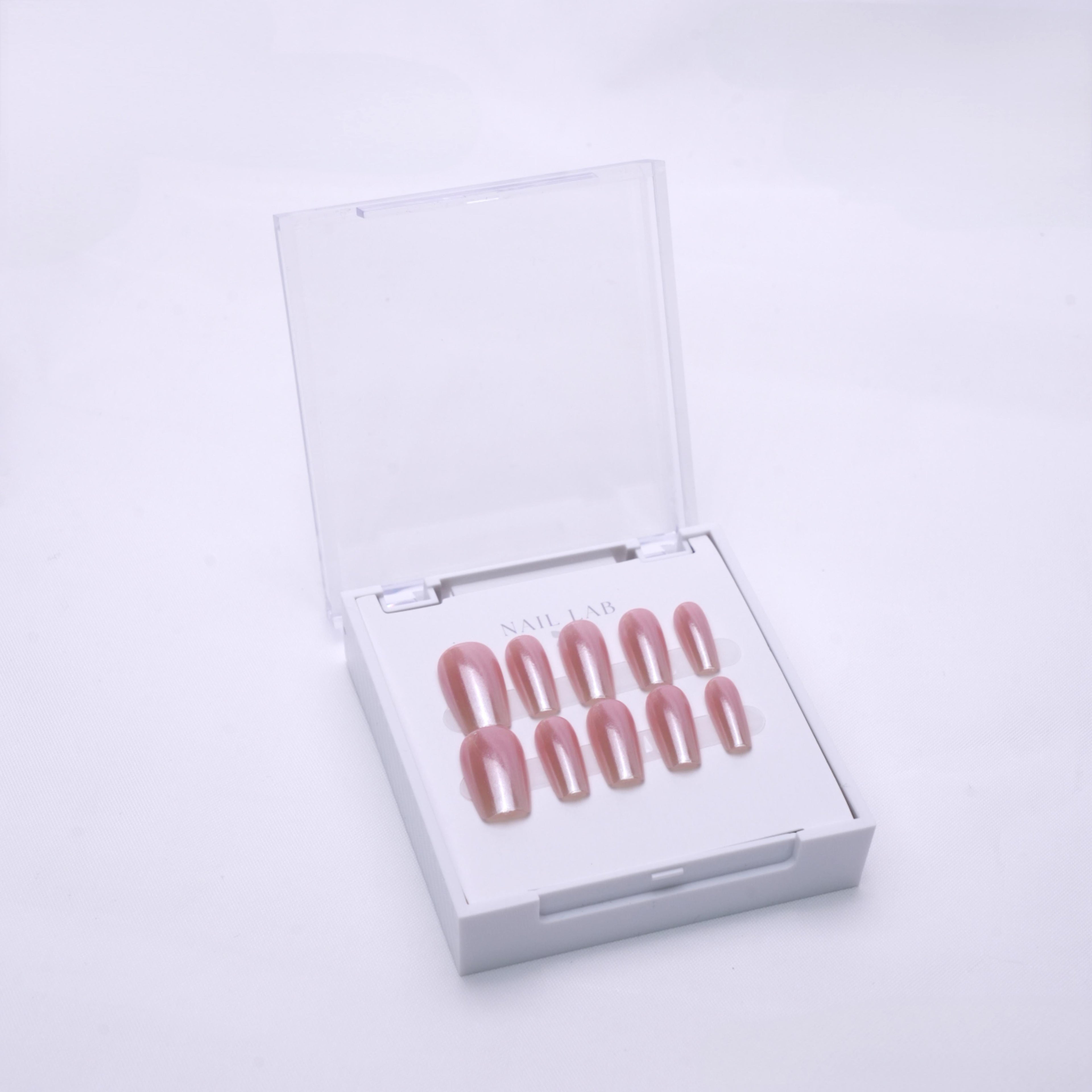 NAIL LAB LIGHTCURE press-on nails in warm rosy nude tones in case