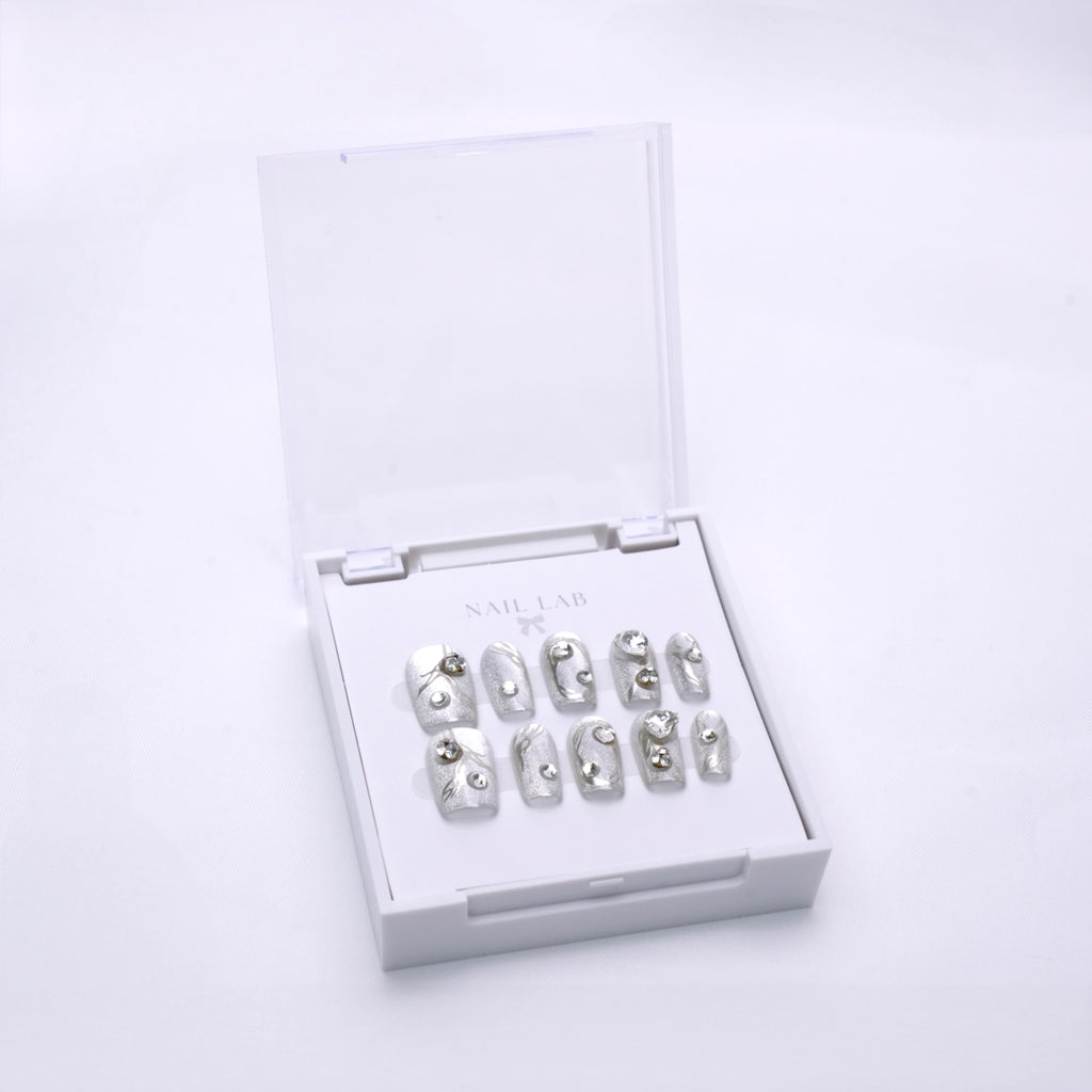 NAIL LAB LIGHTCURE press-on nails in cool icy silver shimmer in case