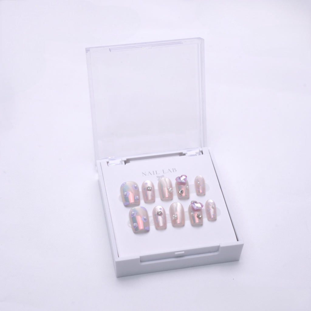 NAIL LAB LIGHTCURE press-on nails in floral-inspired glow finish in case