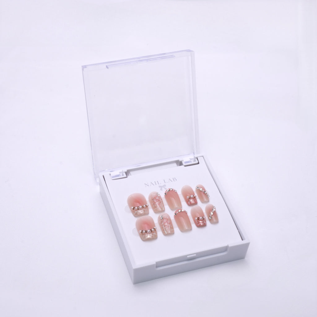 NAIL LAB LIGHTCURE press-on nails in neutral luxe paris-inspired tones in case