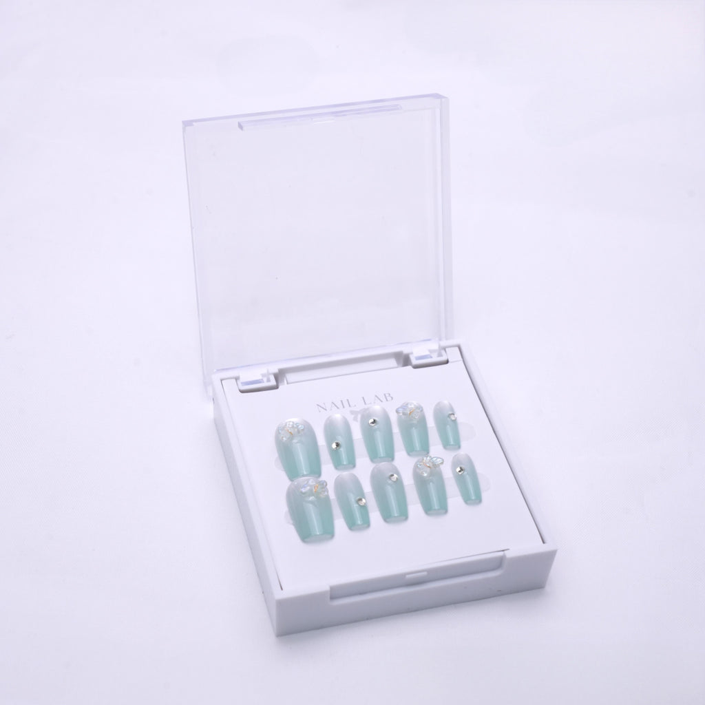 NAIL LAB LIGHTCURE press-on nails in soft mint green accents in case