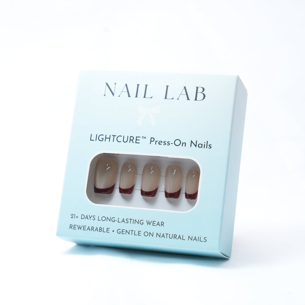 NAIL LAB LIGHTCURE press-on nails in nude with bordeaux red tips