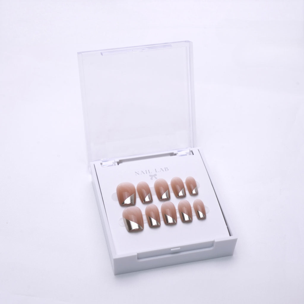 NAIL LAB LIGHTCURE press-on nails in warm golden nude tones in case