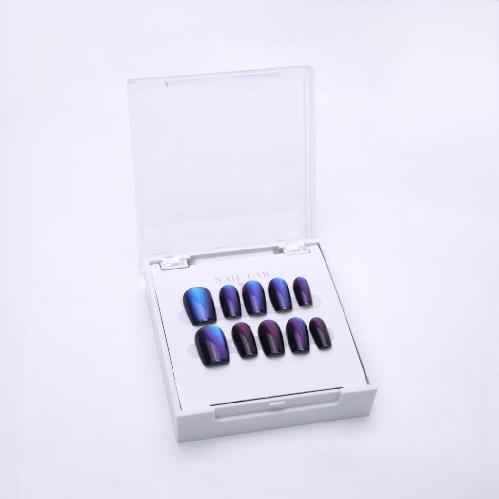 NAIL LAB LIGHTCURE press-on nails in dark iridescent shimmer tones in case