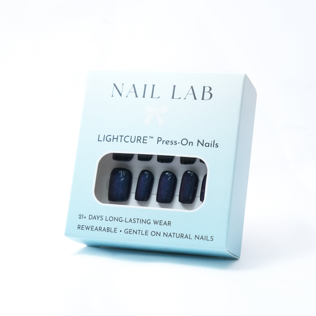 NAIL LAB LIGHTCURE press-on nails in dark base with starry shimmer