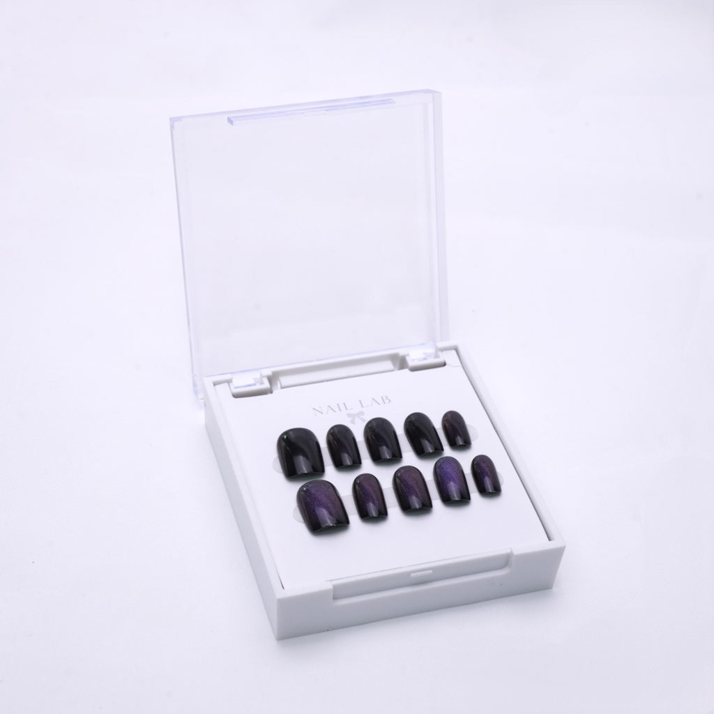 NAIL LAB LIGHTCURE press-on nails in dark base with starry shimmer in case