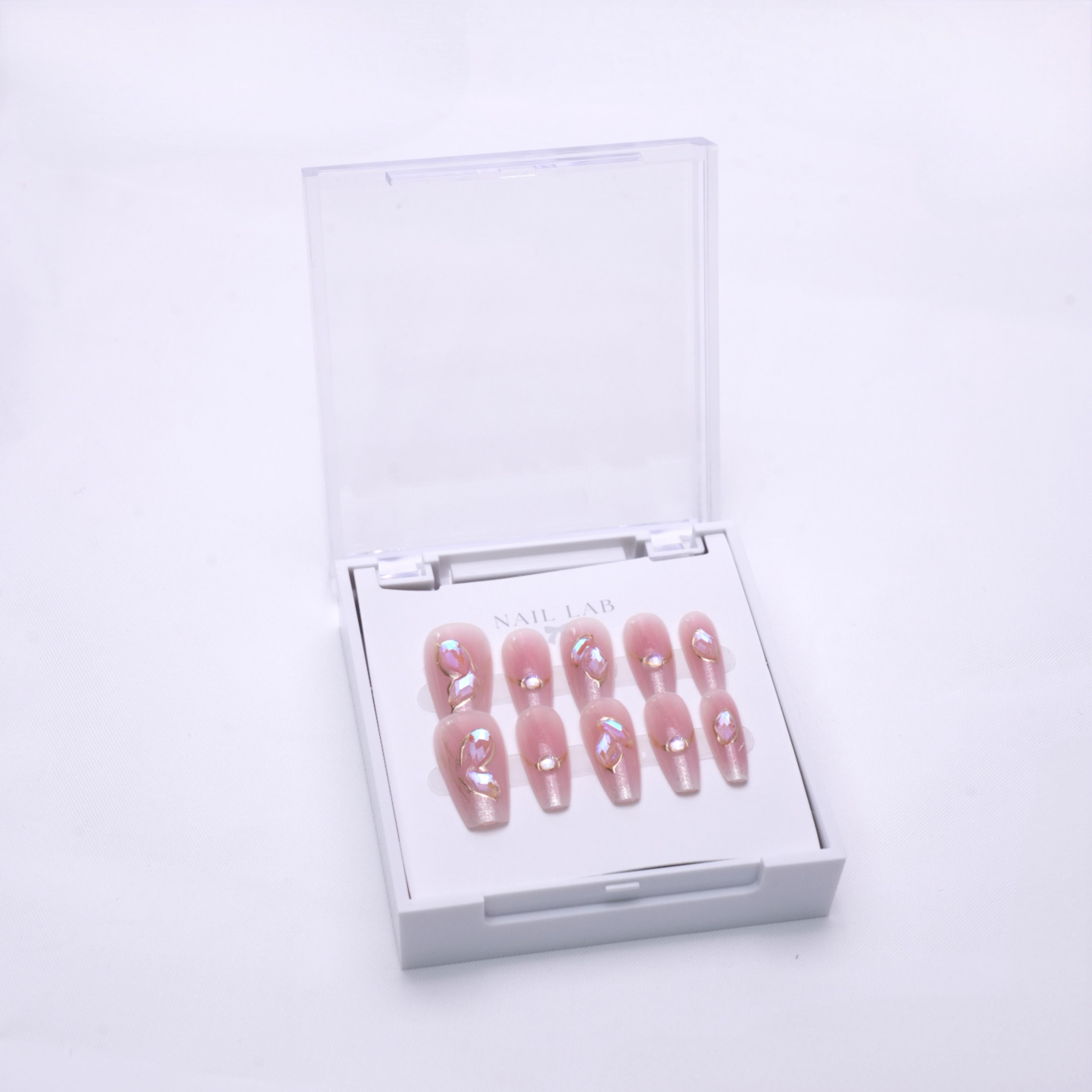 NAIL LAB LIGHTCURE press-on nails in soft pink opalescent shimmer in case