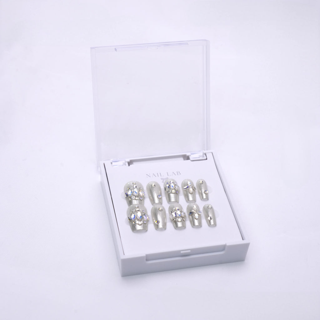 NAIL LAB LIGHTCURE press-on nails in translucent nude with crystal shimmer in case
