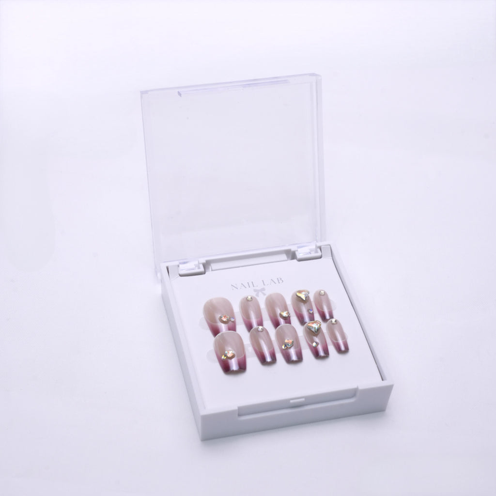 NAIL LAB LIGHTCURE press-on nails in deep merlot wine tones in case