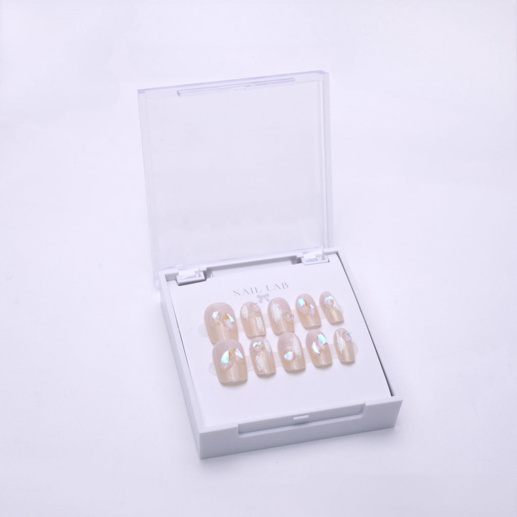 NAIL LAB LIGHTCURE press-on nails in soft ivory nude glow in case