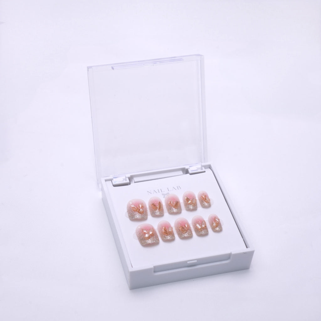 NAIL LAB LIGHTCURE press-on nails in warm champagne shimmer with depth in case