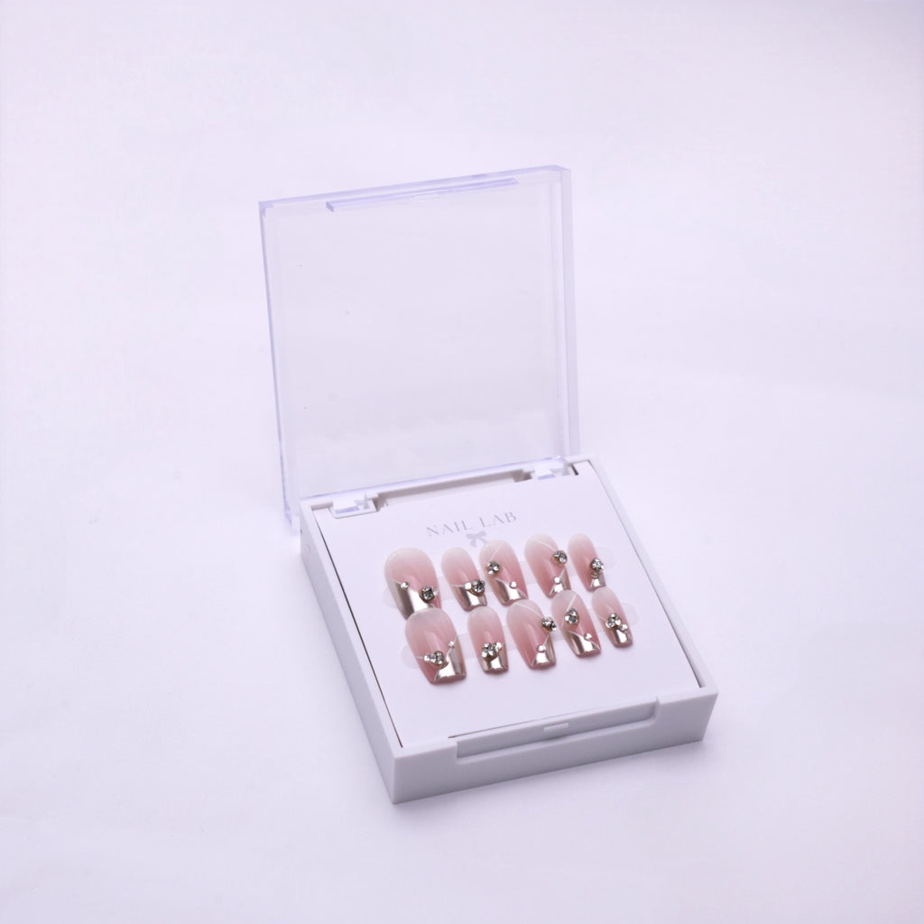 NAIL LAB LIGHTCURE press-on nails in silky nude with constellation shimmer in case