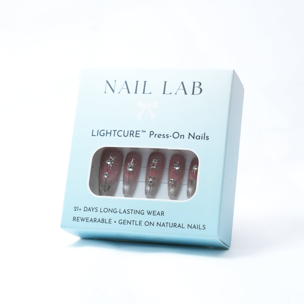 NAIL LAB LIGHTCURE press-on nails in pink base with constellation sparkle