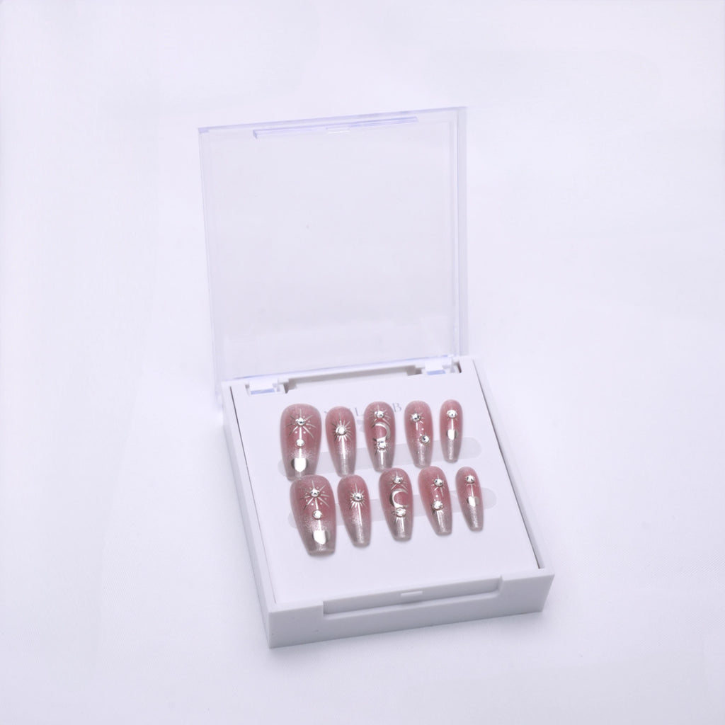 NAIL LAB LIGHTCURE press-on nails in pink base with constellation sparkle in case