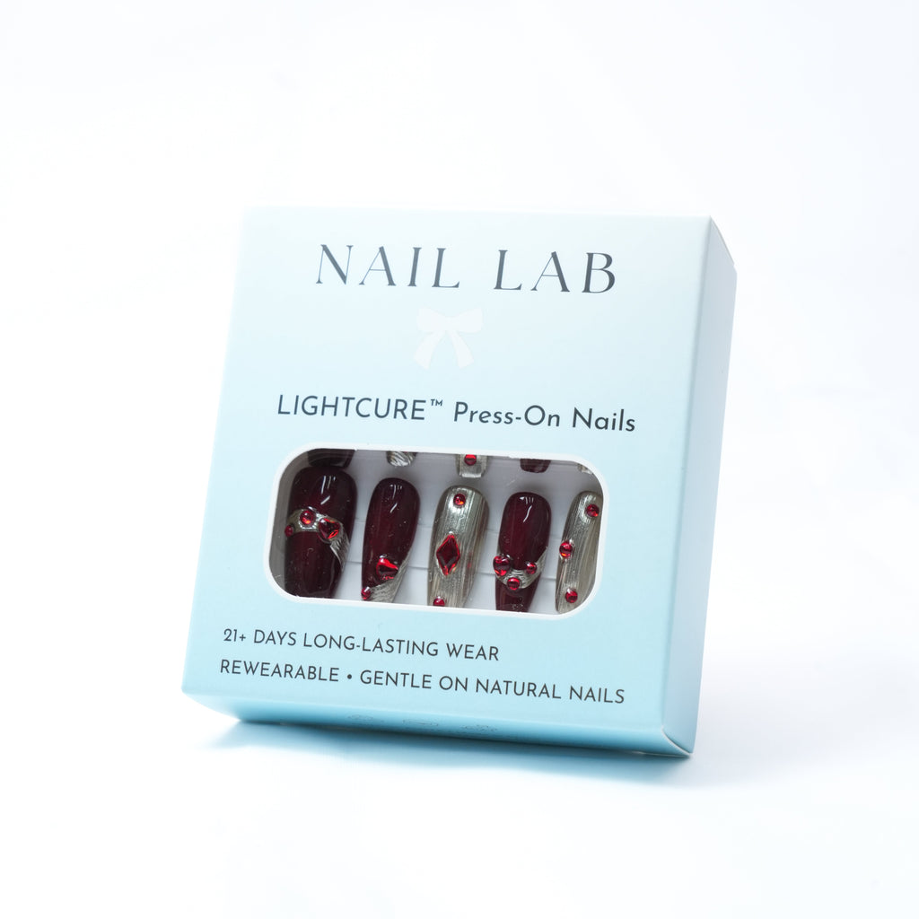 NAIL LAB LIGHTCURE press-on nails in deep ruby red stone accents