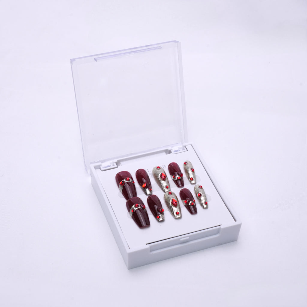 NAIL LAB LIGHTCURE press-on nails in deep ruby red stone accents in case